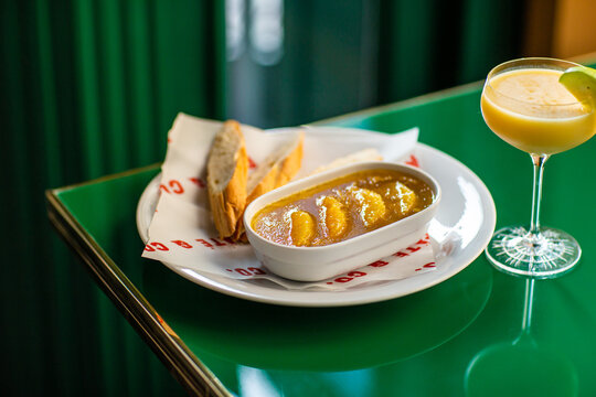 Chicken pate with orange and bread with cocktail