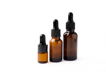Bottles with essential oils isolated on white background. Aromatherapy. Relax.