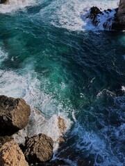 waves crashing on rocks