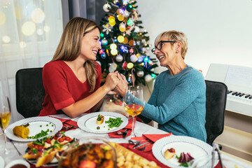 Mother and daughter bond on Christmas dinner