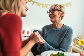 Mother and daughter bond on Christmas dinner