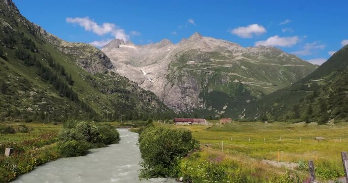 River Rhone and a view at the Rhone glacier from village Gletsch in Switzerland