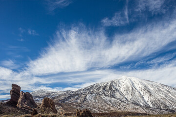 Teide volcano with snow in winter. Snowy mountain. Mountain landscape in winter. Snowy mountain in the background. Snowy mountain in the background.Tenerife, Canary Islands, Spain.