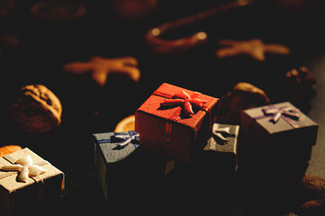 Christmas gifts with gingerbread isolated on a black background
