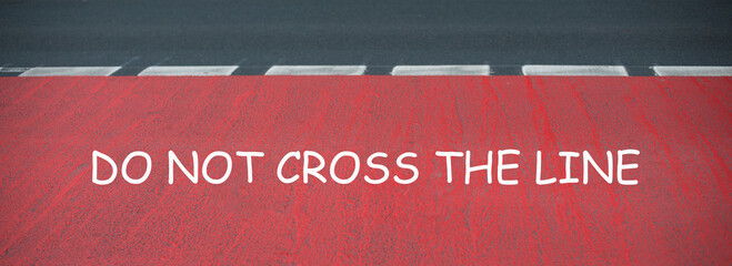 Do not cross the  line is standing on the road,  caution sign, warning
