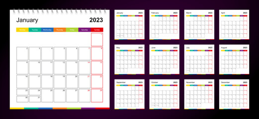 Colorful wall calendar for 2023 on dark background, week starts on Monday.