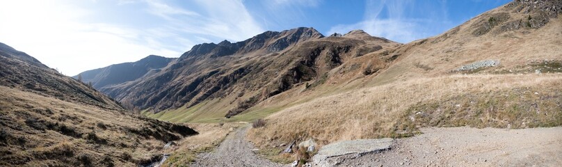 Fototapeta na wymiar Alpine mountain ranges sky roads trails mountains