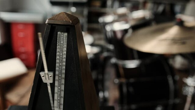 Mechanical metronome for music rhythm and tact measuringworking with sound. Classical tool for musicians and song creators