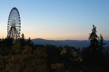 Veiw to the ferris wheel in the Mtatsminda park, Tbilisi, Georgia