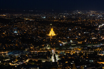 Top view of Tbilisi center and the Holy Trinity Cathedral at night