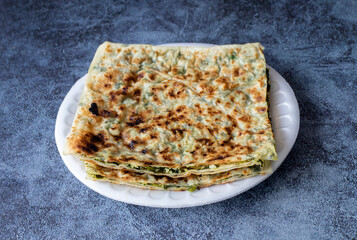 Turkish pancakes with herbs and cheese; Turkish name is hair pastry ( Pancake )