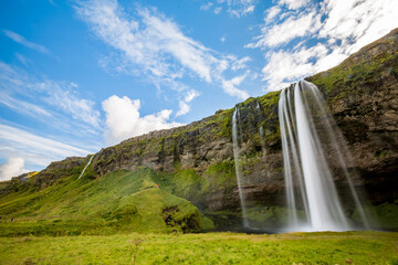 Huge waterfall in Iceland, long exposure travel photograph