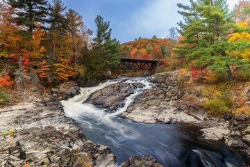 Sainte Ursule Waterfall with fall colors in background . Canada.