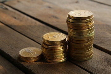 Gifts with a ribbon on a beautiful wooden background.