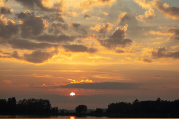 Colorful clouds at sunset as background.