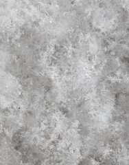 White snowflakes in winter as a background.