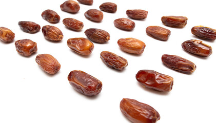 Dried dates isolated on white background.