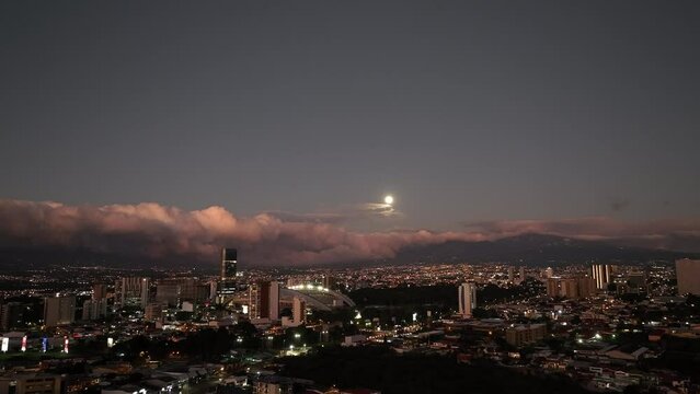 Sunset Aerial view of La Sabana Park and Costa Rica National Stadium with San Jose, Costa Rica in the background