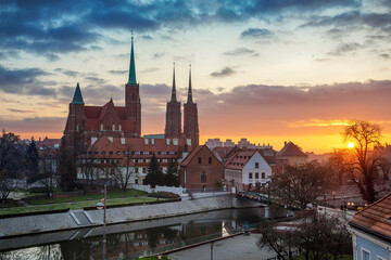 Morning view, sunrise on Wroclaw Old Town. Island and Cathedral of St John with bridge through river Odra. Wroclaw, Poland.