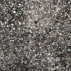 The pattern small black and grey pebbles stone as background. pebbles texture wall and floor.