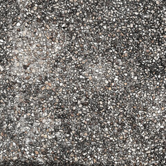 The pattern small black and grey pebbles stone as background. pebbles texture wall and floor.