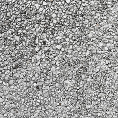 The pattern small black and grey pebbles stone as background. pebbles texture wall and floor.