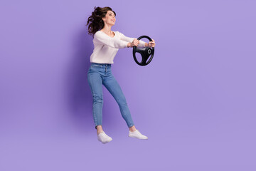 Profile side full length photo of cheerful cute lady look empty space drive new fast own car enjoy...