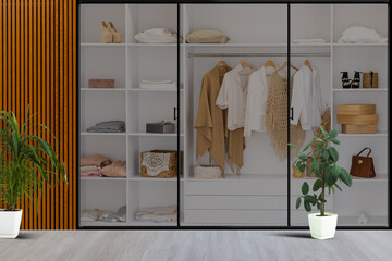 Big wardrobe with different clothes for dressing room. Interior structure of wardrobe body and shelf design