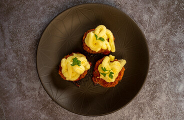 Turkish Food Hasanpasa Kofte - Kofta with Puree - Meatball with Bechamel Sauce and Green Peas. Traditional Food.