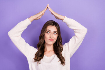 Obraz na płótnie Canvas Photo of young funky dreamy pouted lips woman wear white pullover showing palm hands symbol look empty space isolated on purple color background