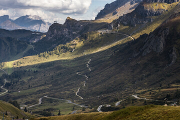 Clouds over mountain Sella Pass in Dolomites