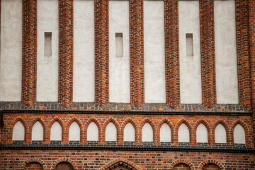 Ancient architecture. Brick wall. Old antique brickwork. Arches and patterns