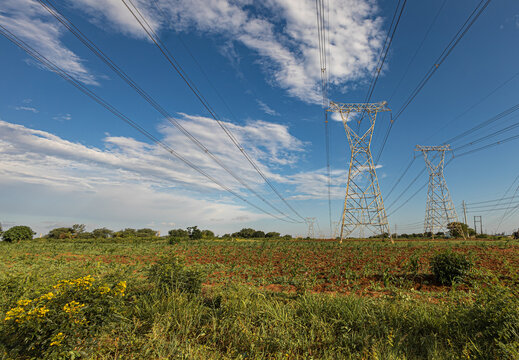 Power Lines In Africa Against Blue Sky