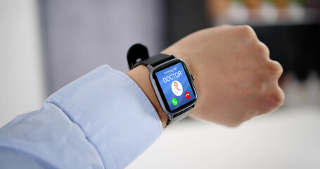 Hand Wearing Smart Watch With Doctor's Incoming Call