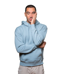 Fototapeta premium Concerned young man posing against background