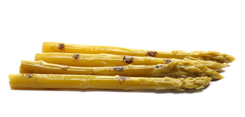 Grilled green asparagus in sour liquid isolated on white
