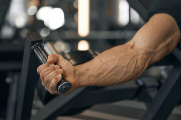 Power mans hand. Muscular and veins