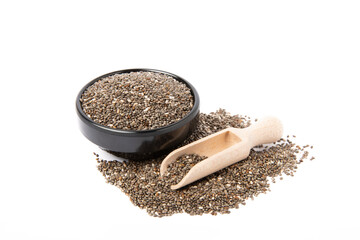 Chia seeds in black ceramic bowl isolated on white background. Superfood. Healthy food. Diet.
