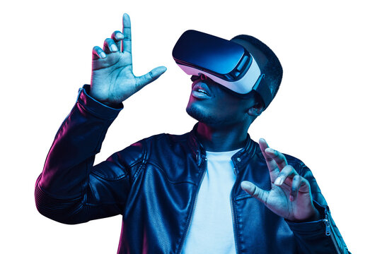 Fototapeta Portrait of african man wearing virtual reality headset, exploring metaverse world