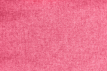 Texture of plain viva magenta wool textile background