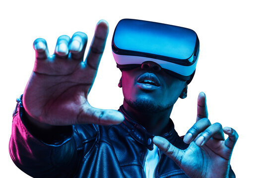 Young african man wearing virtual reality goggles with hands up