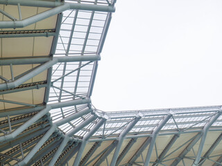 Arch of the stadium.   Part of the roof of the stadium. Rain canopy in a modern stadium