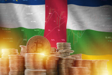 Central African Republic flag and big amount of golden bitcoin coins and trading platform chart. Crypto currency concept