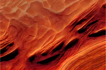 Fotobehang een rood en oranje landschap met op de achtergrond een bergketen en daarboven een blauwe lucht met een paar wolken. © Oleg