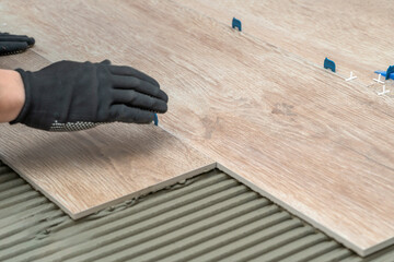 Laying tiles in the bathroom or kitchen