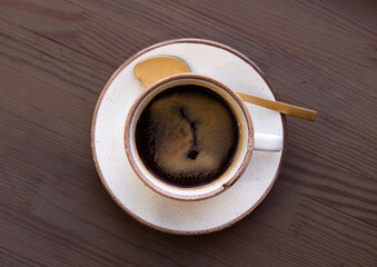 Cup background on a wooden surface.