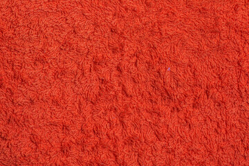 Orange terry towel background. Terry cloth texture - obrazy, fototapety, plakaty