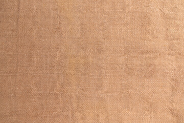 Fototapeta na wymiar fragment of burlap close up, fabric background