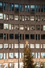 building in the city with christmas tree