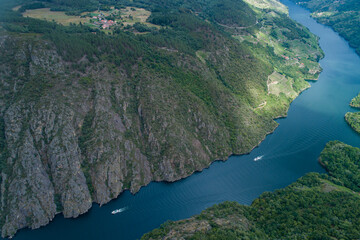 view of the Miño river canyon in the Ribeira Sacra on a cloudy day, world heritage site. Galicia, Spain.